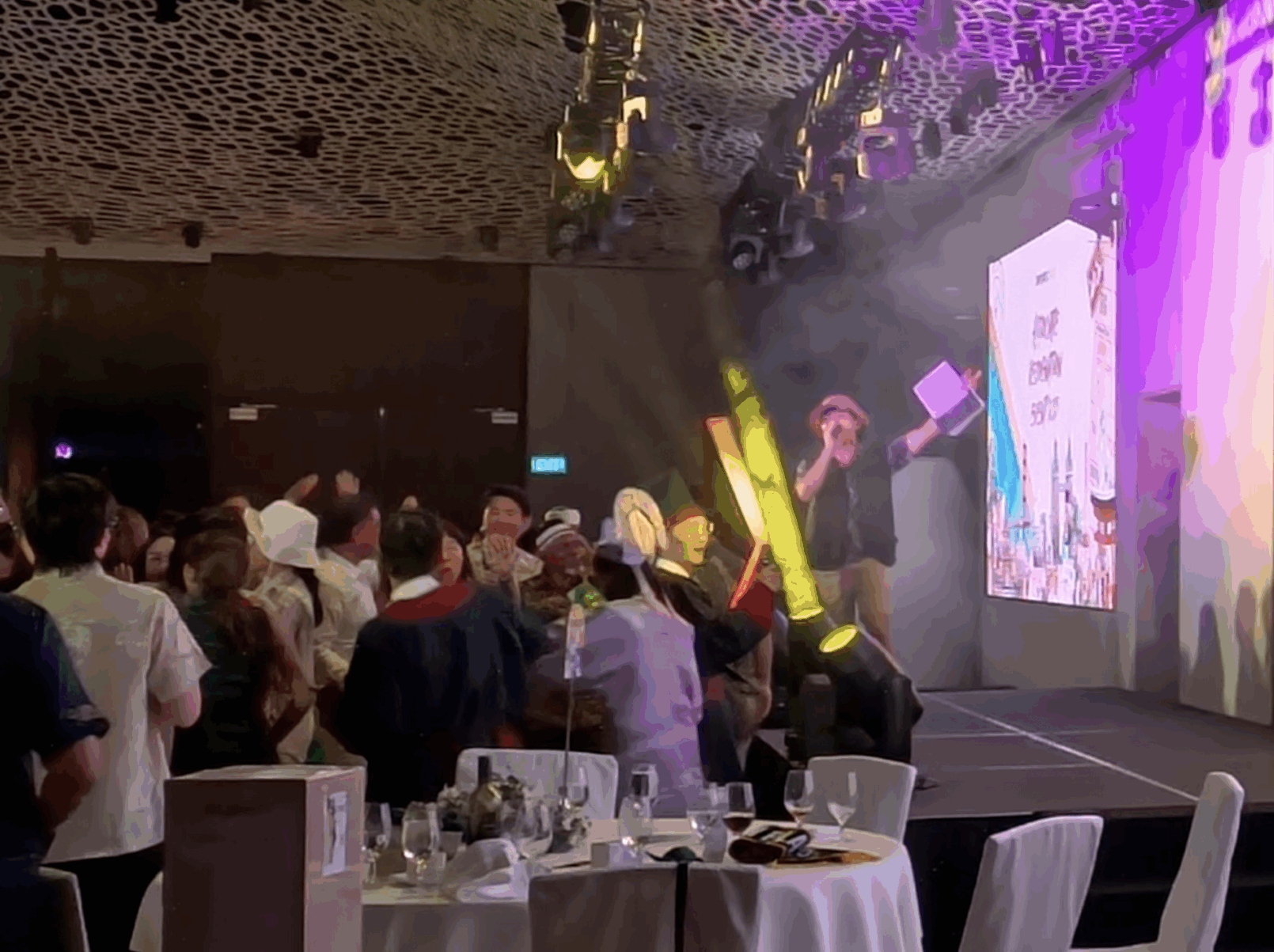 An emcee, De Zhong, hosting a corporate DND at Mandai Rainforest Resort in Singapore in December